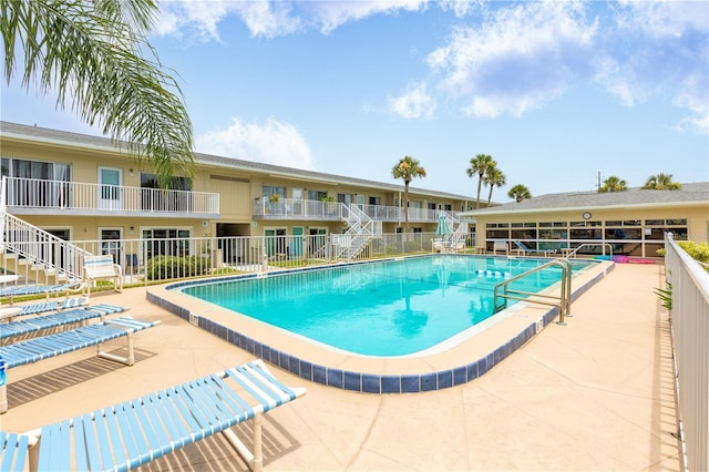 view of pool featuring a patio area