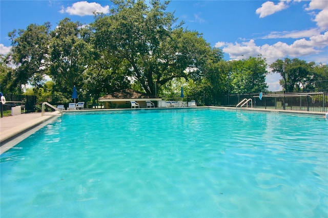 pool featuring fence