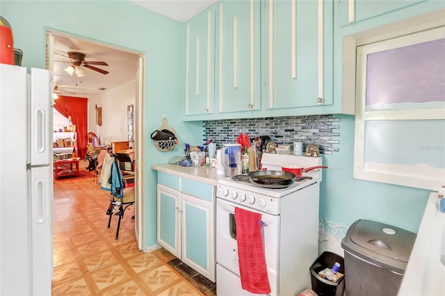 kitchen featuring decorative backsplash, ceiling fan, and white appliances