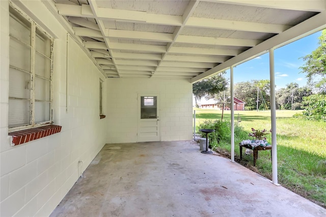 view of patio / terrace with an attached carport