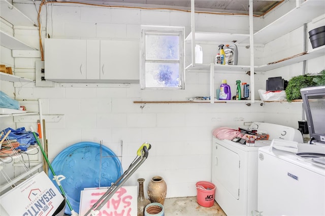 laundry area featuring separate washer and dryer