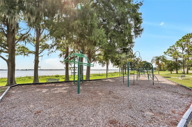 view of play area with a water view