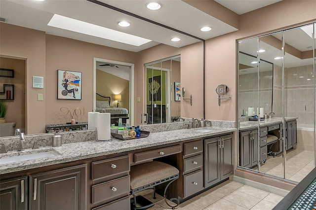 bathroom with vanity and tile patterned floors