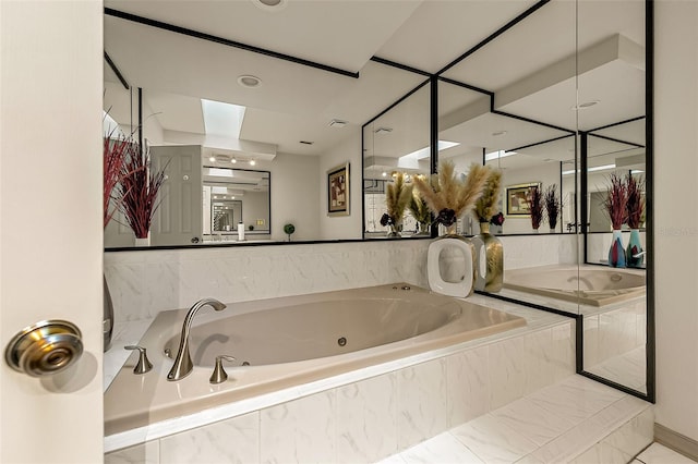 bathroom featuring tiled tub