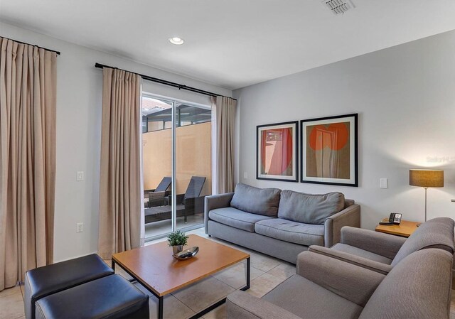 living room featuring light tile patterned flooring