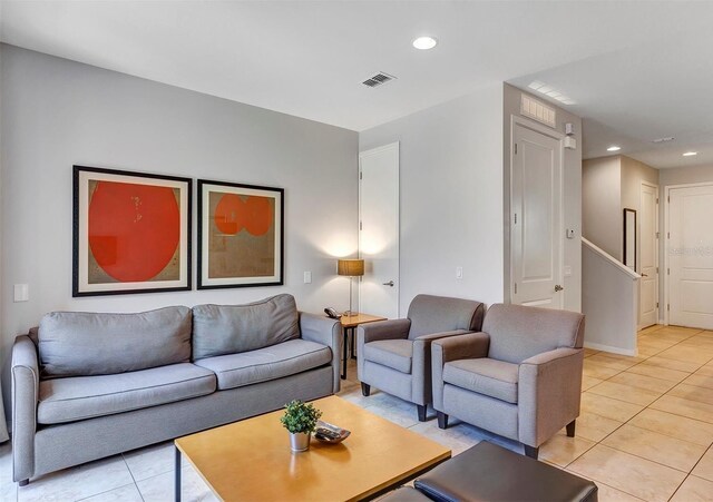 living room with light tile patterned floors