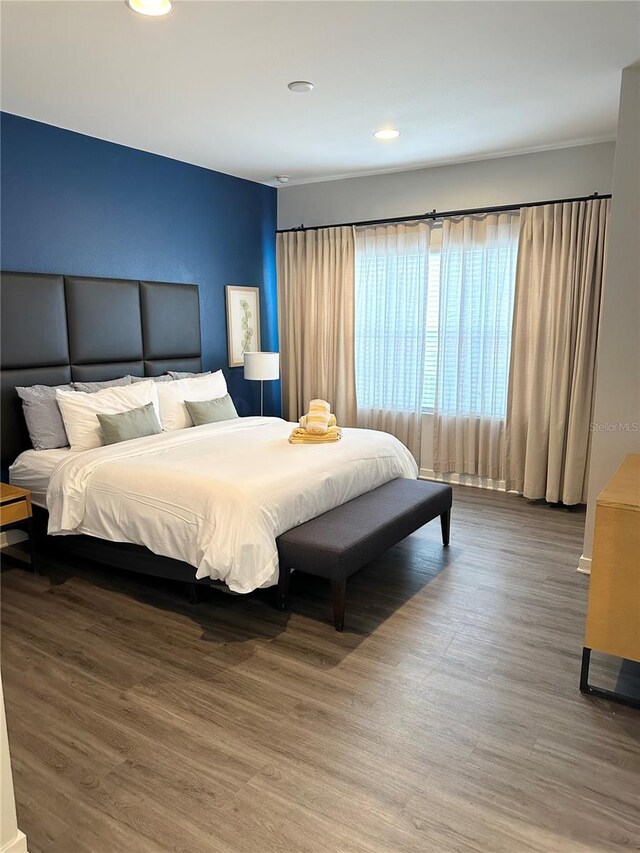 bedroom featuring hardwood / wood-style flooring