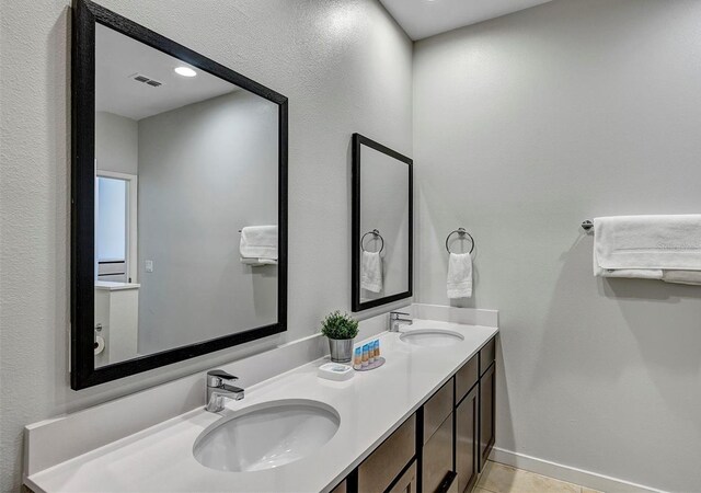 bathroom featuring vanity and tile patterned floors