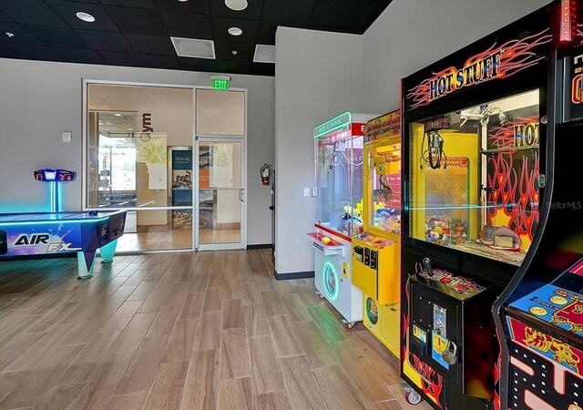 game room featuring light hardwood / wood-style floors and billiards