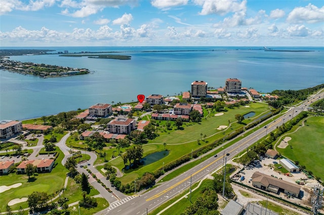 drone / aerial view with a water view