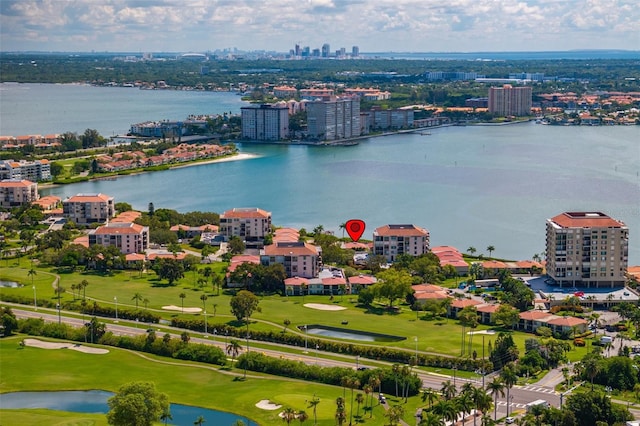 birds eye view of property featuring a water view