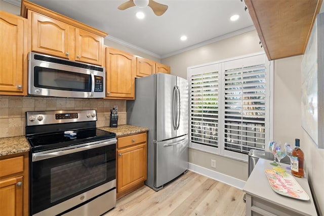 kitchen featuring crown molding, light hardwood / wood-style flooring, appliances with stainless steel finishes, light stone countertops, and backsplash