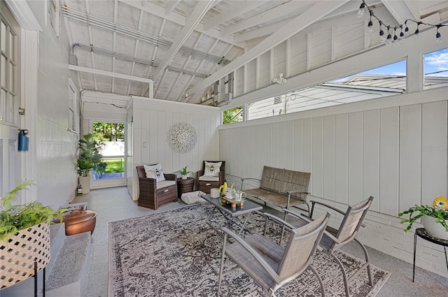 interior space featuring vaulted ceiling