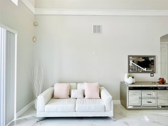 9060 Heritage Bay Cir, Orlando, FL 32836 - living area with baseboards, marble finish floor, arched walkways, and visible vents