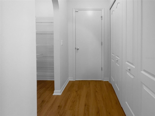 hall featuring light hardwood / wood-style floors