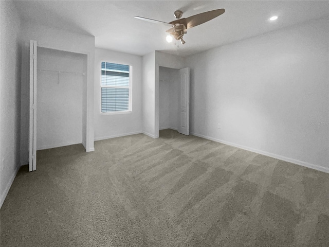 unfurnished bedroom with carpet, a closet, and ceiling fan