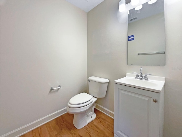 3444 97th Ln E, Palmetto, FL 34221 - half bathroom featuring wood finished floors and vanity