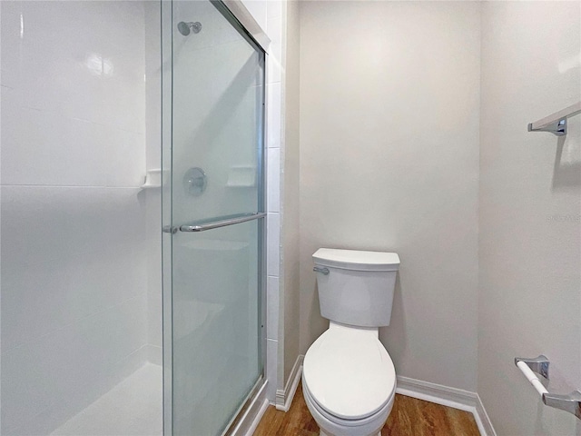 3444 97th Ln E, Palmetto, FL 34221 - full bathroom with a stall shower and wood finished floors