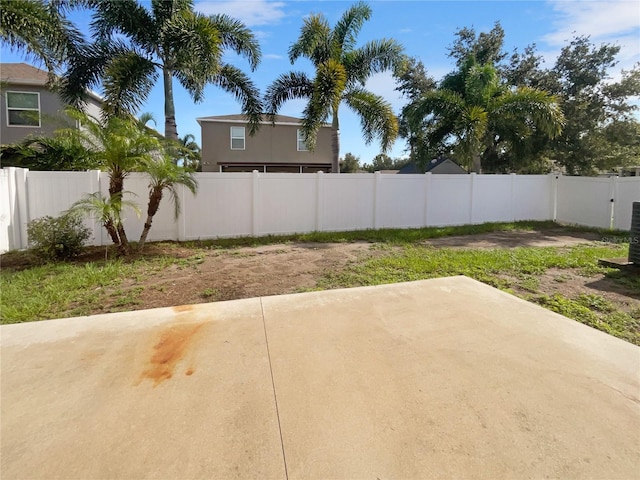 3444 97th Ln E, Palmetto, FL 34221 - fenced backyard with a patio