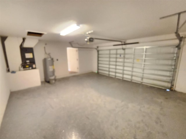 garage featuring gas water heater, heating unit, and a garage door opener