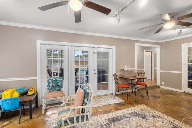 living area featuring parquet floors, ornamental molding, rail lighting, ceiling fan, and french doors