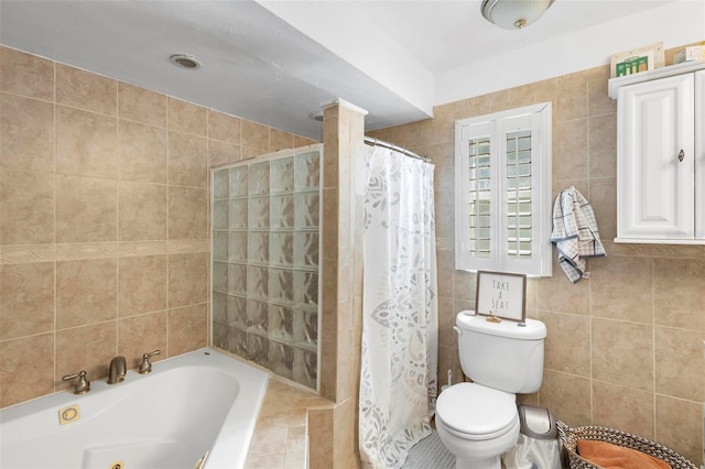 bathroom featuring tile walls, toilet, independent shower and bath, and tile patterned floors