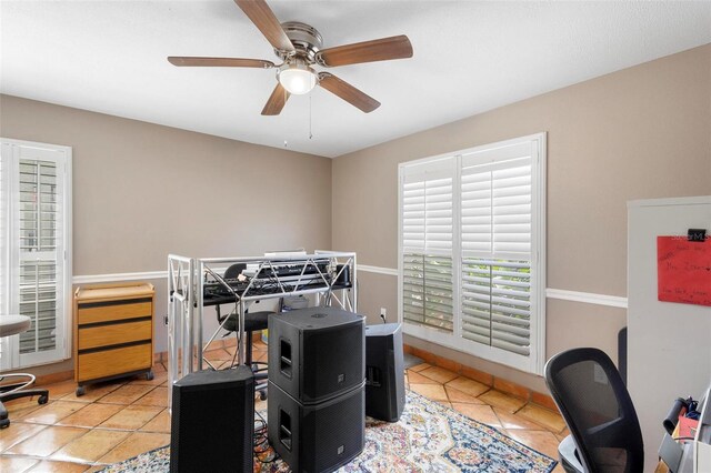 bedroom featuring ceiling fan and light tile patterned floors