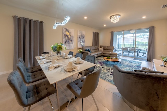 dining area featuring light tile patterned floors, visible vents, and recessed lighting