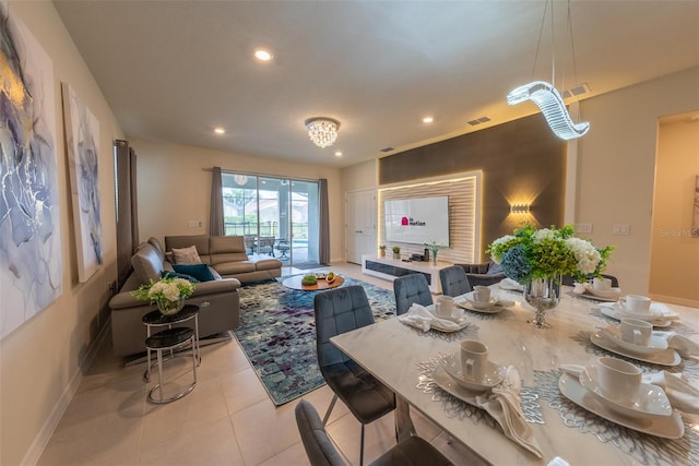 dining area with light tile patterned flooring