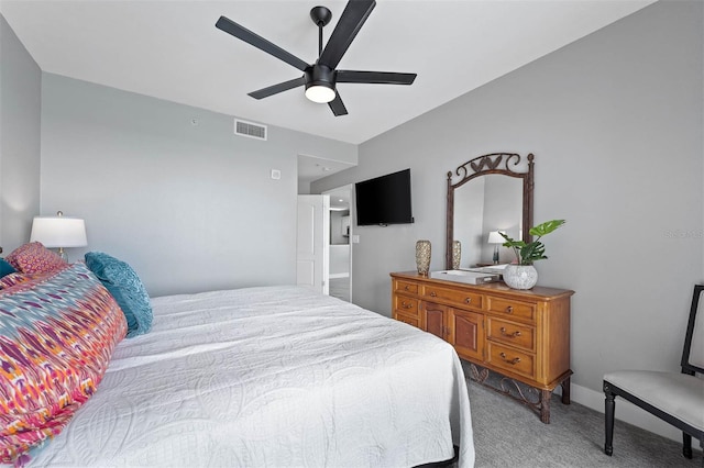 carpeted bedroom featuring ceiling fan