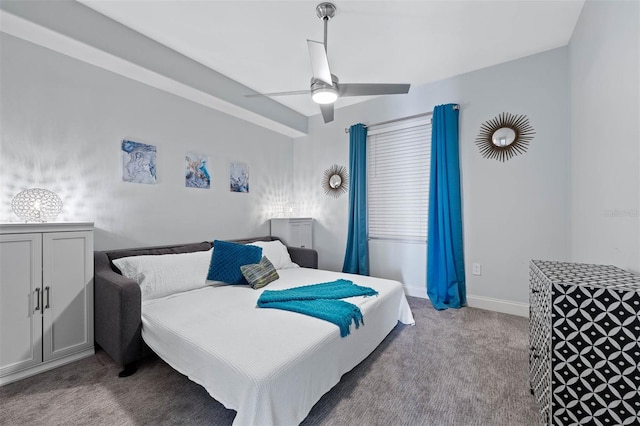 bedroom with ceiling fan and light carpet