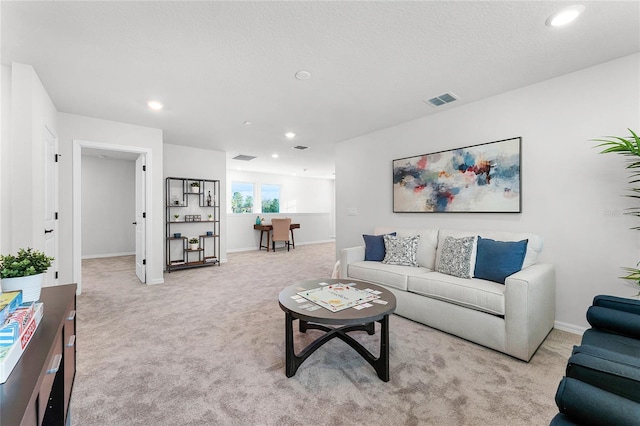 living room with light colored carpet