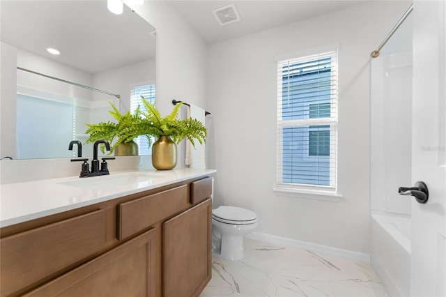 full bathroom featuring shower / bathing tub combination, vanity, and toilet