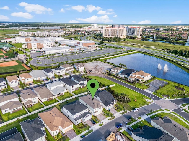 bird's eye view with a water view