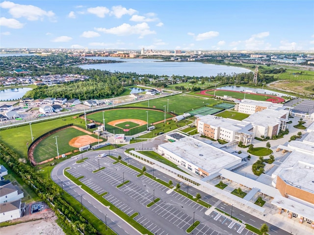 birds eye view of property with a water view