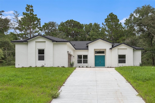 view of front of property with a front lawn