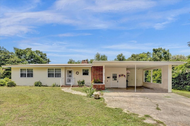 ranch-style house with a carport and a front yard