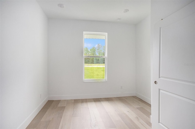 empty room with light wood-type flooring