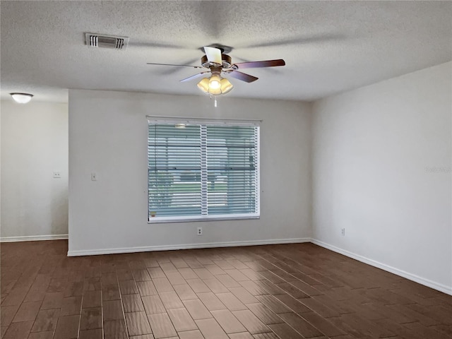 unfurnished room featuring a textured ceiling and ceiling fan