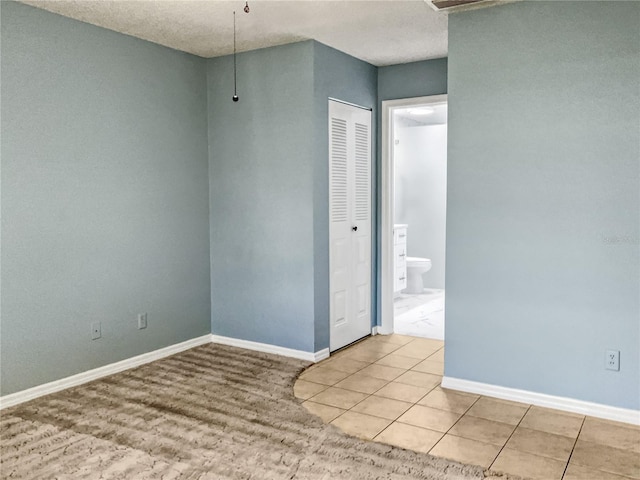 view of tiled spare room