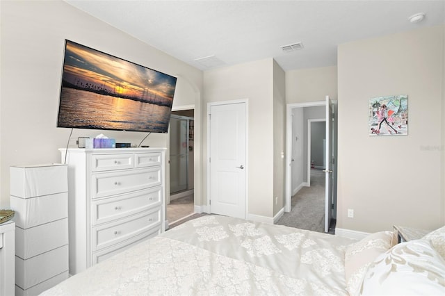 carpeted bedroom with a closet