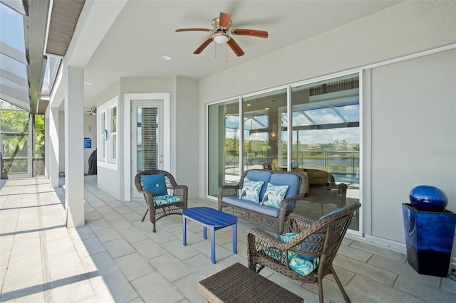 view of patio / terrace featuring an outdoor hangout area, ceiling fan, and a lanai