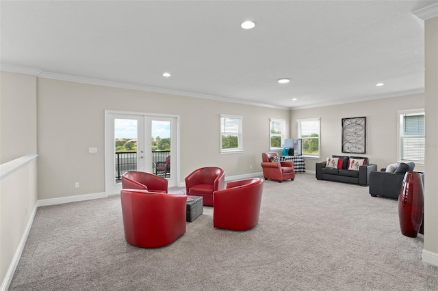 carpeted living room featuring crown molding and french doors