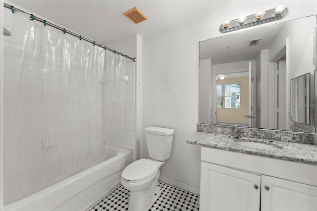 full bathroom with shower / bath combo with shower curtain, toilet, and vanity