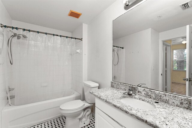 full bathroom with vanity, toilet, and shower / bath combination with curtain