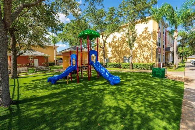 view of jungle gym featuring a yard