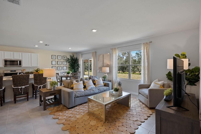 living room featuring light tile patterned floors