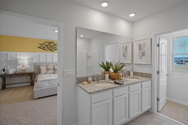 bathroom with vanity and tile patterned floors