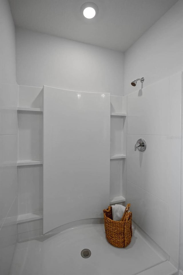 bathroom with walk in shower