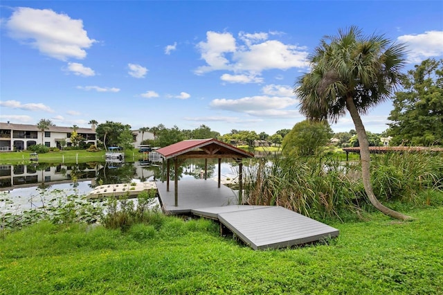 dock area featuring a water view